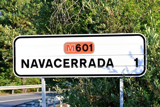 A road sign on the M-601 regional road, indicating the direction to Navacerrada, located in the Community of Madrid, Spain.July 15, 2026