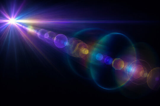 Abstract rainbow color light with lens flare effect on black background for design overlay.