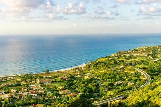 beautiful seascape of resort landscape on amazing sea coast with white baots green coasts and brisht sunset or sunrise cloudy sky of the colorful vacation summer landscape