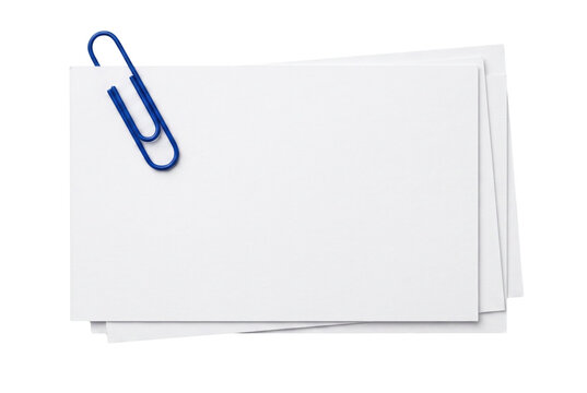 Blank white index cards with blue metal paper clip