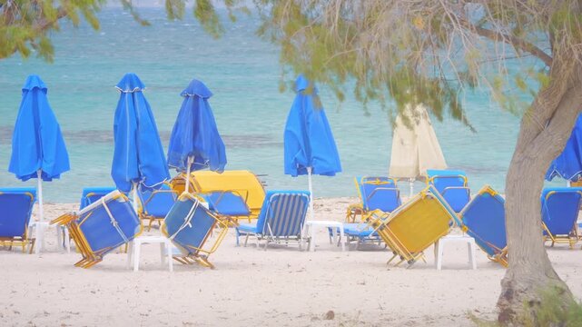 A beach on Kos island with sunbeds and umbrellas in slow motion 60fps