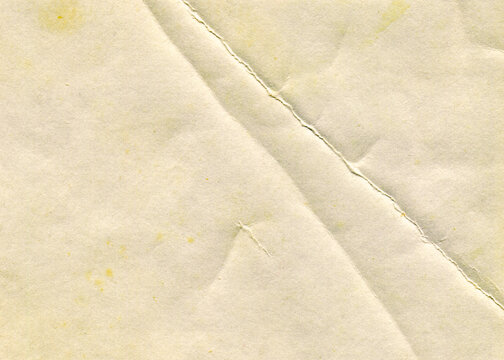 Vintage paper texture. Old stained paper background with copy space. Aged and yellowed paper.