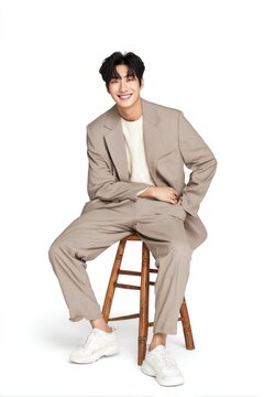 Smiling man in beige suit
