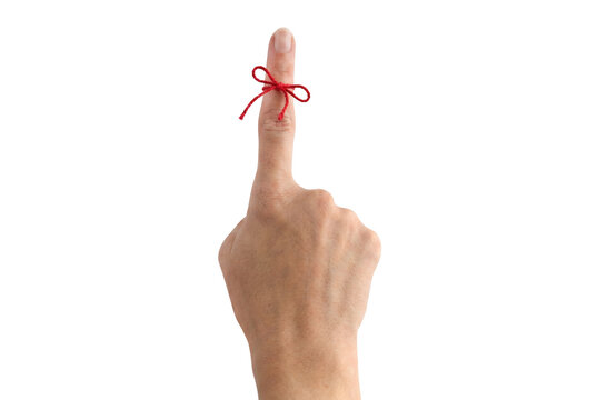 Red string tied around a finger as a reminder aid