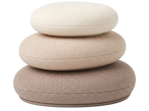 Stacked round floor cushions beige isolated on black background, representing a zen stone cairn, modern minimalist fabric poufs for home decor and meditation, cozy neutral interior design elements.