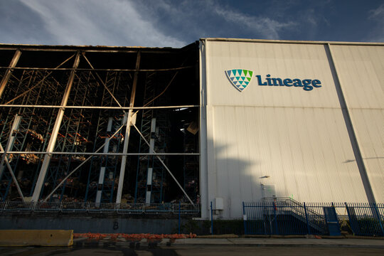 Los Angeles, California, USA - July 3, 2026: Afternoon sun heats the burnt aftermath of the Lineage warehouse fire in Boyle Heights.