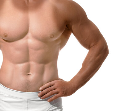 Young man with suntan lines left after wearing sleeveless shirt, closeup. White background