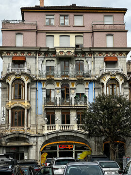 Montreux, Switzerland - 11.03.2026.  Symmetrical, straight-on shot of an ornate historic building facade in Montreux, Switzerland, showcasing detailed Belle &Eacute;poque architecture. The multi-story struct