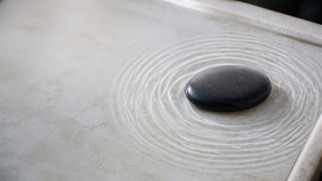 Concentric Ripples Settle around One Calm Stone