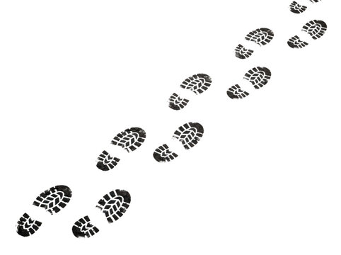 Black shoe footprints walking in diagonal line as PNG isolated on transparent background