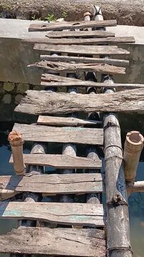 old wooden brigde on the river 