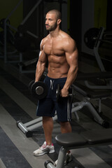 Fototapeta premium Young Man Doing Exercise For Shoulders