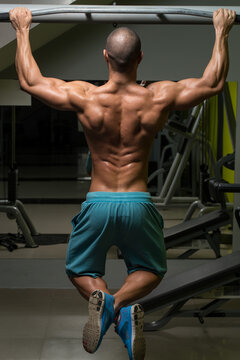 Male Athlete Doing Pull Ups
