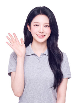 Cheerful Young Asian Woman Waving Hello or Goodbye