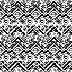 Fototapeta premium Craft art high-detail, detailed. Monochrome abstract tribal seamless pattern. Wild background with zigzags, squares, diamonds, and lines. Hand-drawn. Ink. American design. Black and white geometric 