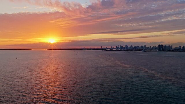 Seascape at summer vacation. Skyscape with sea horizon. Horizon sunrise sea with ship. Sunrise seascape. Romantic summer vacation Miami seascape. Sea sunset horizon. Sunset dramatic sky