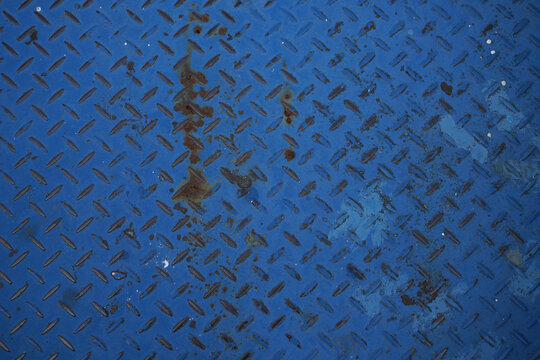 Rusted Blue Textured Metal Panel Surface