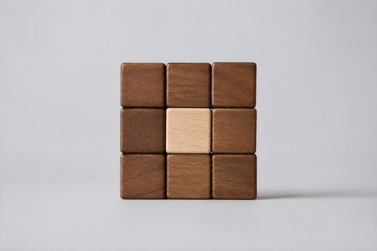 Stack of Wooden Cubes with One Light Wood Block, Leadership and Uniqueness Business Concept