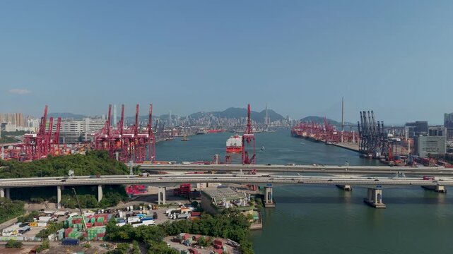 July 11 2026 Cargo vessels navigate busy deepwater shipping container channel.