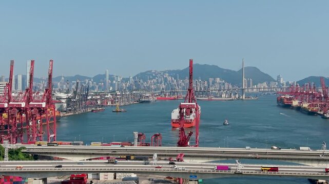July 11 2026 Cargo vessels navigate busy deepwater shipping container channel.