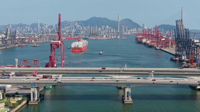July 11 2026 Cargo vessels navigate busy deepwater shipping container channel.