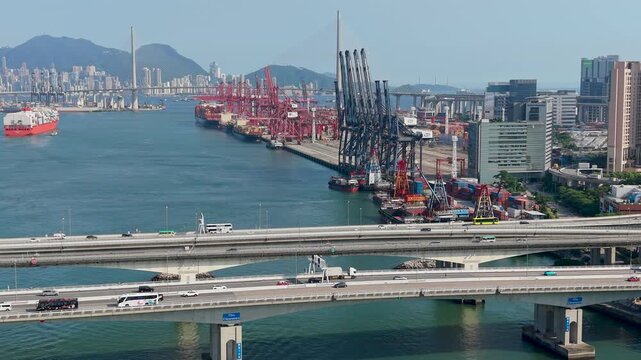 July 11 2026 Cargo vessels navigate busy deepwater shipping container channel.