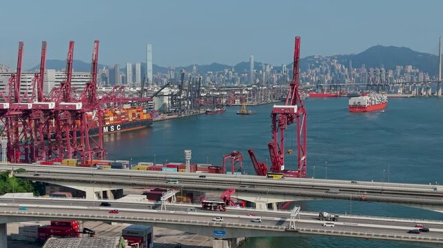 July 11 2026 Cargo vessels navigate busy deepwater shipping container channel.