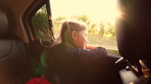road, fingers, childhood dream, child girl feeling breeze hair, driving along road van adventure, looking road ahead, kid child enjoying sun travel travel, feeling freedom, little girl child kid
