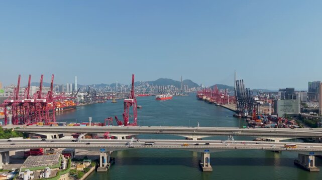 July 11 2026 Cargo vessels navigate busy deepwater shipping container channel.