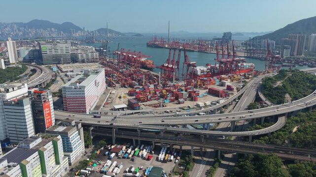 July 11 2026 Cargo vessels navigate busy deepwater shipping container channel.