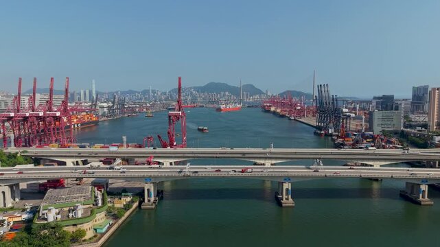 July 11 2026 Cargo vessels navigate busy deepwater shipping container channel.