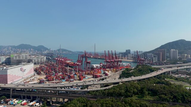 July 11 2026 Cargo vessels navigate busy deepwater shipping container channel.