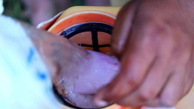 Perfect framing of farmer mixing chemical poison pesticides in agricultural spray tank 180fps Captured in Cinematic High Detail Footage
