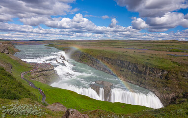 gullfoss waterfall with rainbow in iceland © Oleg