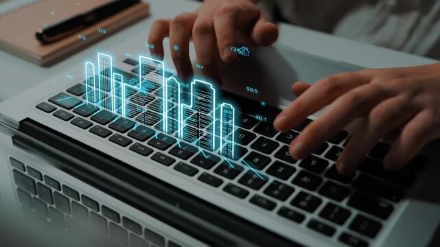 A Person Using Laptop Keyboard with Virtual Financial Data and Graphs Overlay Technology in a Modern Office Setup for Business and Finance Concepts. Entropy.
