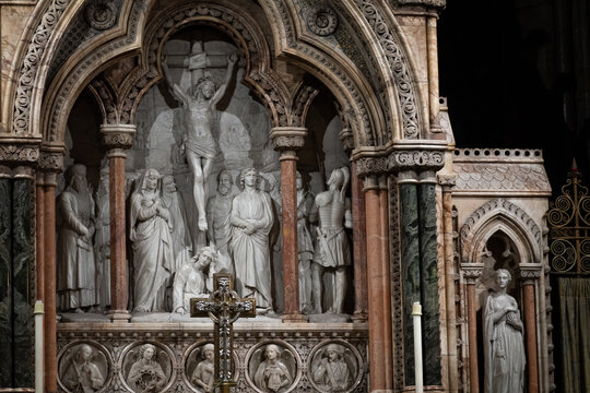 Architectural close-up of the elaborate Reredos with religious sculptures and decorative details