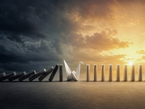Domino Effect Under Stormy Sky
