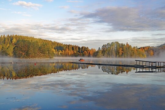 Fog drifts over a calm lake, foliage colouring, October, Bullaren, V&auml;str&auml; G&ouml;tland, Sweden