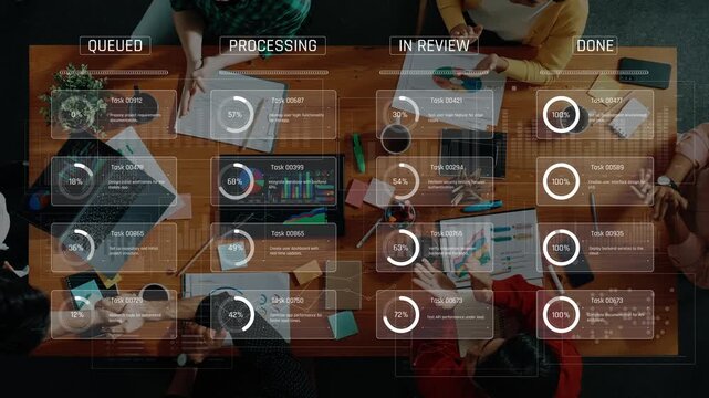 An overhead view of a team collaborating in an office space with project management tools, showing various task statuses on a wooden table to enhance productivity. Raster