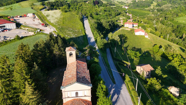 Aerial View of a Historic Church and Winding Road in Piedmont