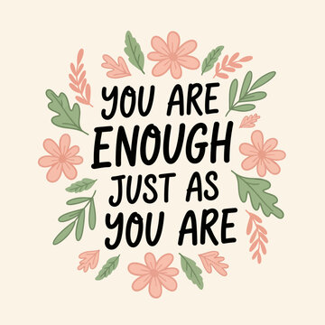 Hand-drawn doodle typography illustration with the quote You Are Enough Just As You Are surrounded by a pastel floral wreath with pink flowers and green leaves on a cream background.