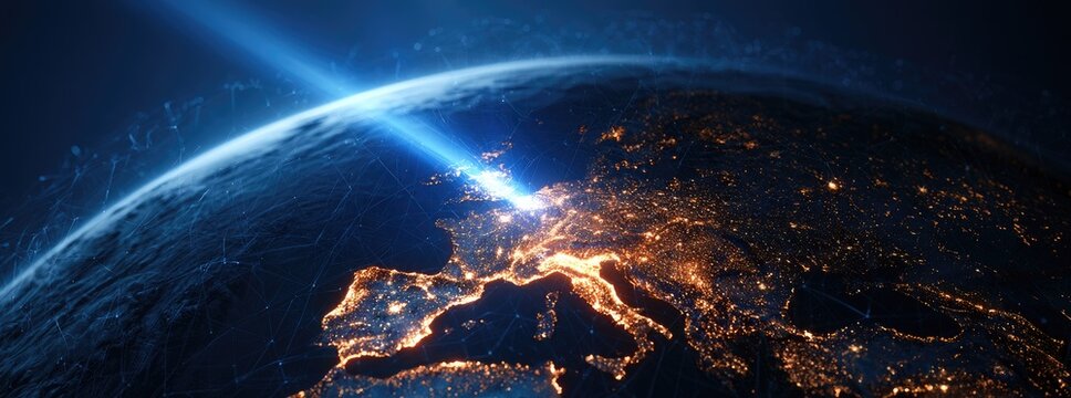 Blue beam pierces Earth's atmosphere over illuminated continents at night