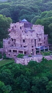 Summer aerial view featuring Gillette Castle in East Haddam, Connecticut at sunrise