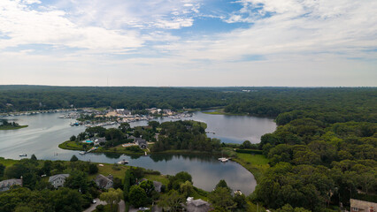 Fototapeta premium Long Island aerial seeing marina and green forest
