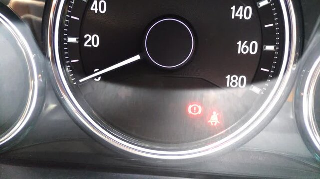 Active panel with left turn signal flashing, seatbelt sign on, handbrake sign on illuminated now for driving safety