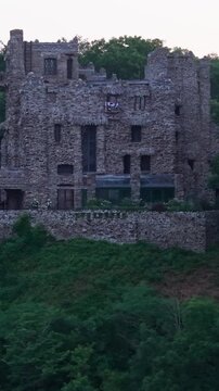 Summer aerial view featuring Gillette Castle in East Haddam, Connecticut at sunrise