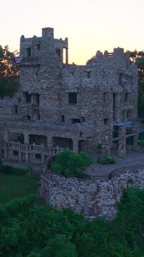 Summer aerial view featuring Gillette Castle in East Haddam, Connecticut at sunrise