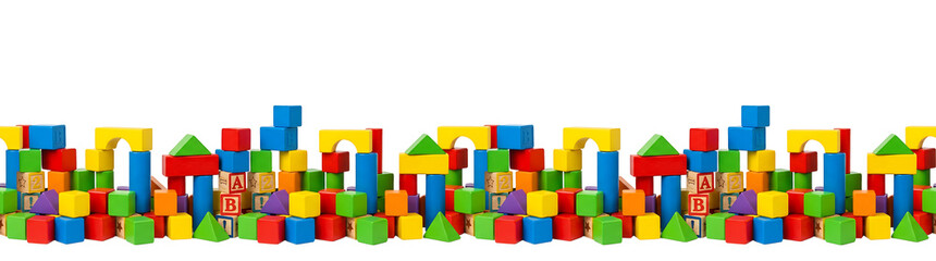 Naklejka premium Colorful wooden toy blocks forming a castle like wall.. seamless bord