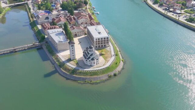Visegrad, Bosnia and Herzegovina &ndash; May 30, 2026: Drone view of Andricgrad peninsula extending into the Drina River in eastern Bosnia