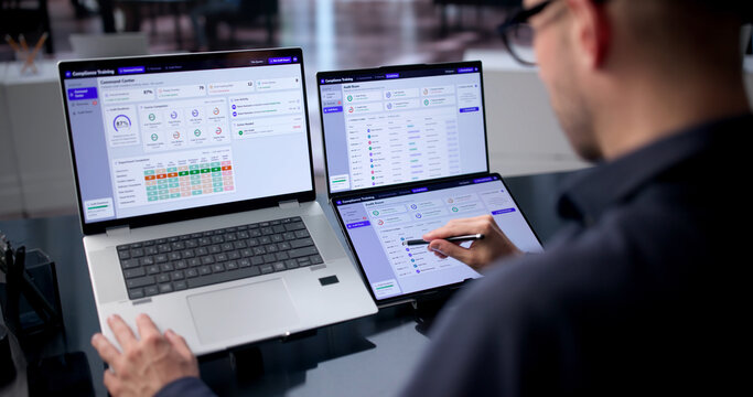 IT Manager Reviews Compliance Dashboard